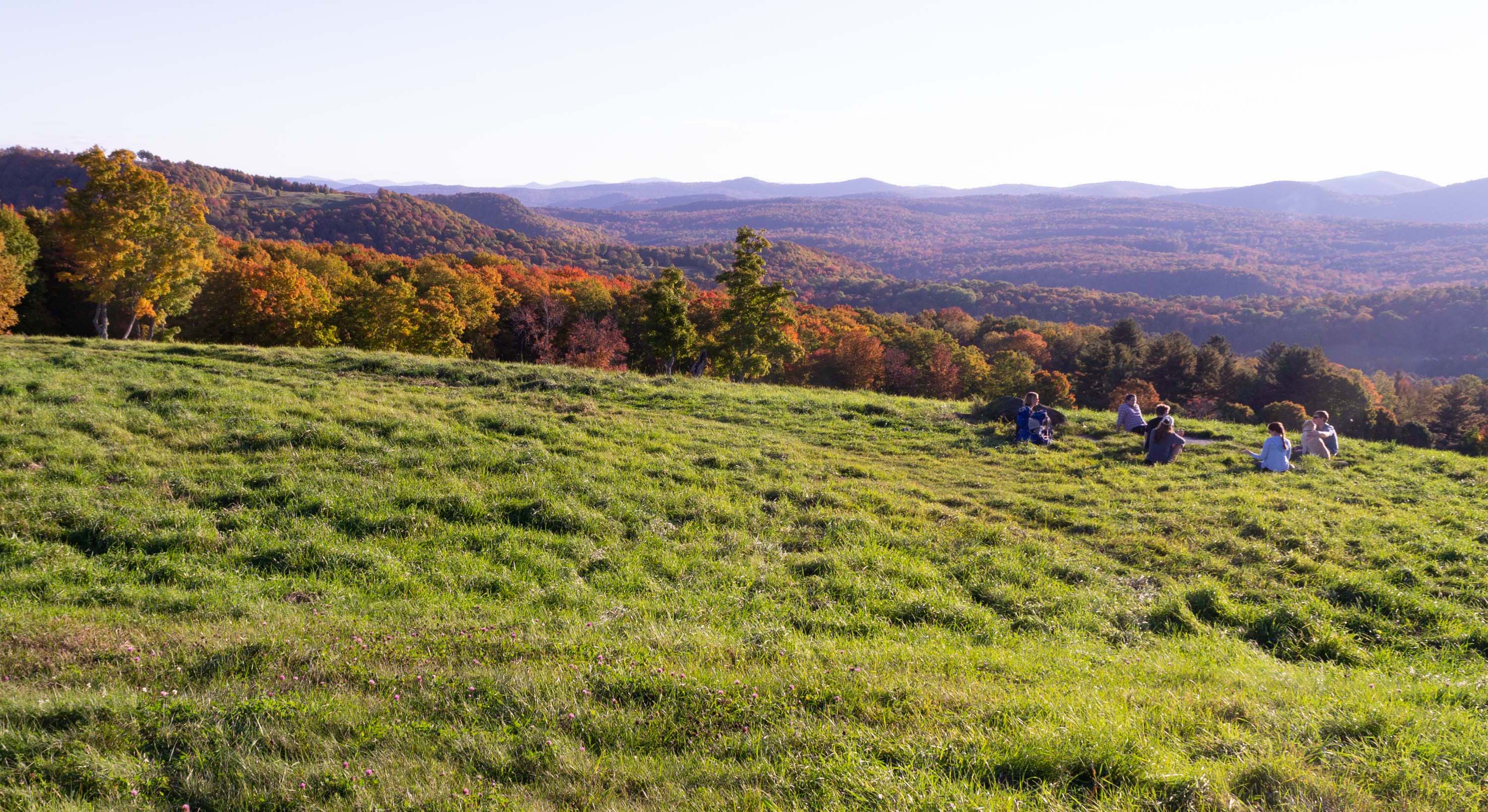 Students outside on a hilltop in Vermont