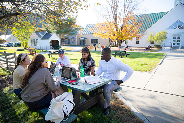 Master's in Public Policy students studying outside at Vermont Law School