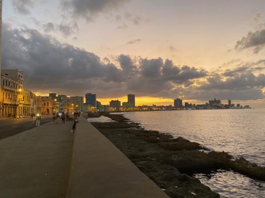An evening walk along Havana's iconic Malecon.