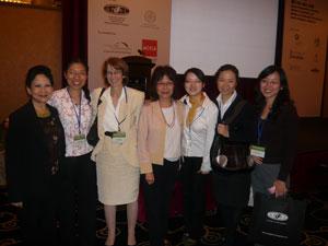 Photo of Janet Milne and ninth annual conference organizers.