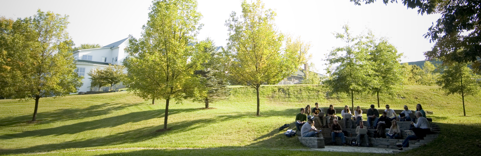 Students at Vermont Law School campus in an outdoor classroom.