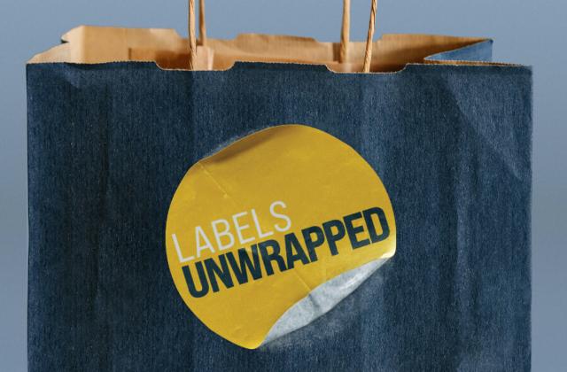 A paper bag with a sticker that reads "Labels Unwrapped"