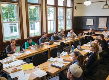 A group of students holding a panel discussion.