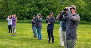 Vermont Law and Graduate School faculty, staff, and students birdwatching during Summer Session