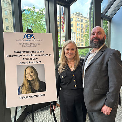 Delcianna Winders accepts the American Bar Association Tort Trial and Insurance Practice Section's (TIPS) Excellence in Advancement of Animal Law Award