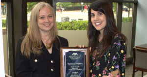 Delcianna Winders accepts the American Bar Association Tort Trial and Insurance Practice Section's (TIPS) Excellence in Advancement of Animal Law Award