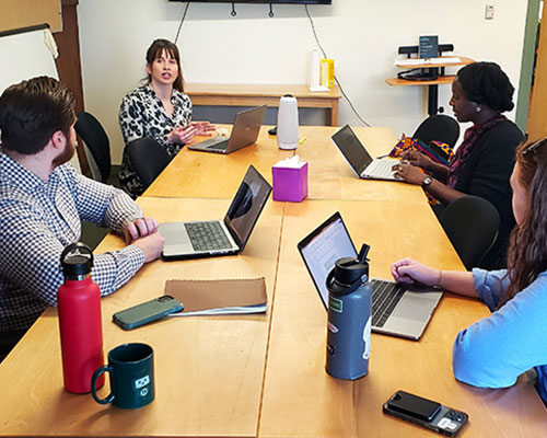 Food and Agriculture Clinic director Emma Scott and student clinicians.