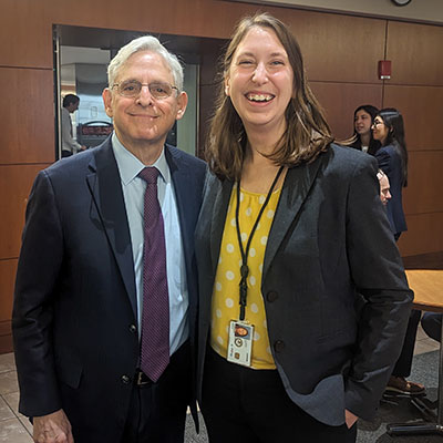 VLGS student Kira Jannusch alongside Attorney General Merrick Garland at her JD externship with the U.S. Department of Justice.