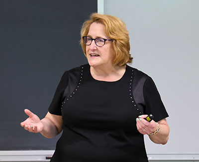 Dr. Kirsten Bookmiller JD'26, professor in the Department of Government, Law, and International Relations and a faculty associate with the Center for Disaster Research and Education at Millersville University